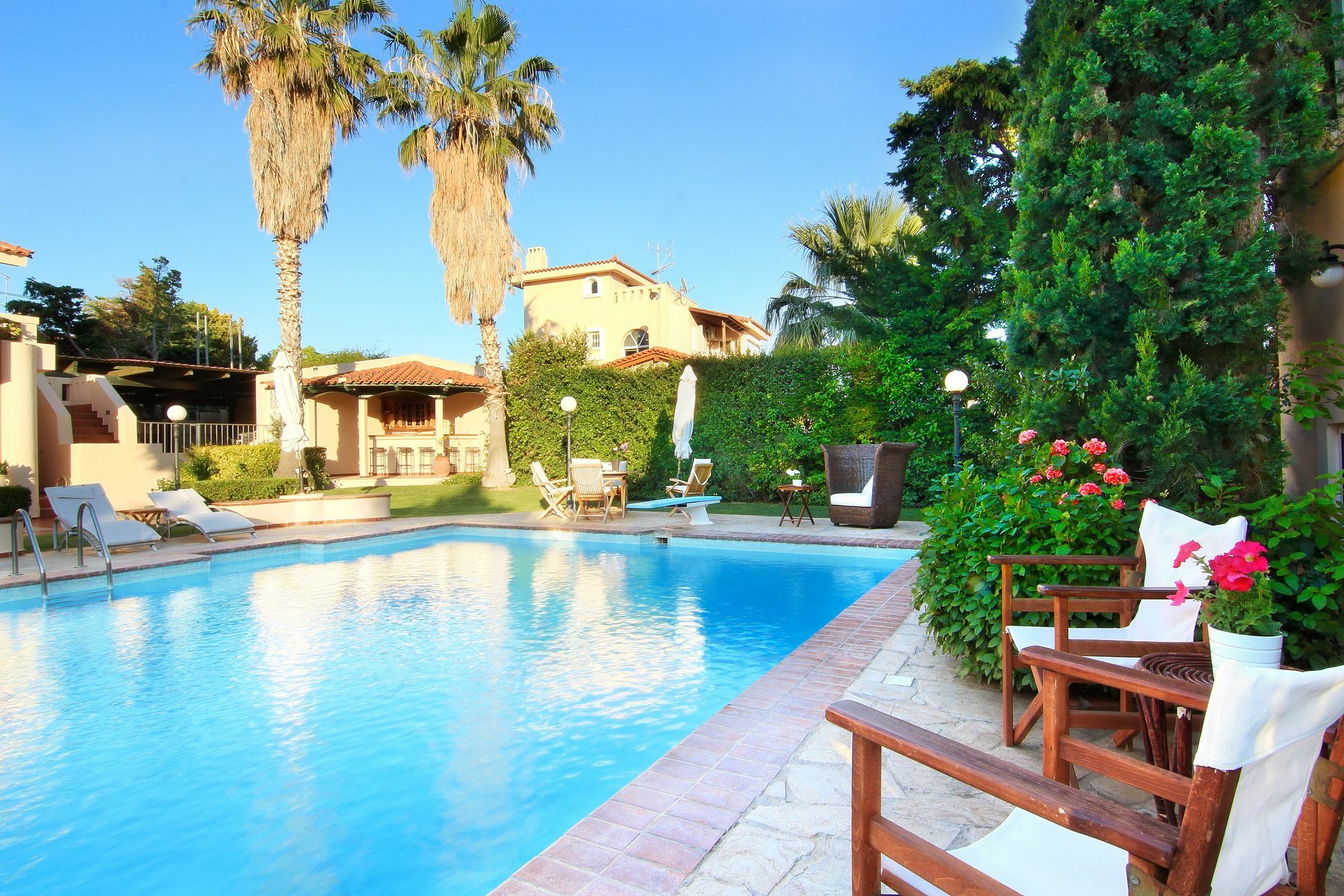 Oasis Pool House By Ghh Villa Lagonisi Bagian luar foto